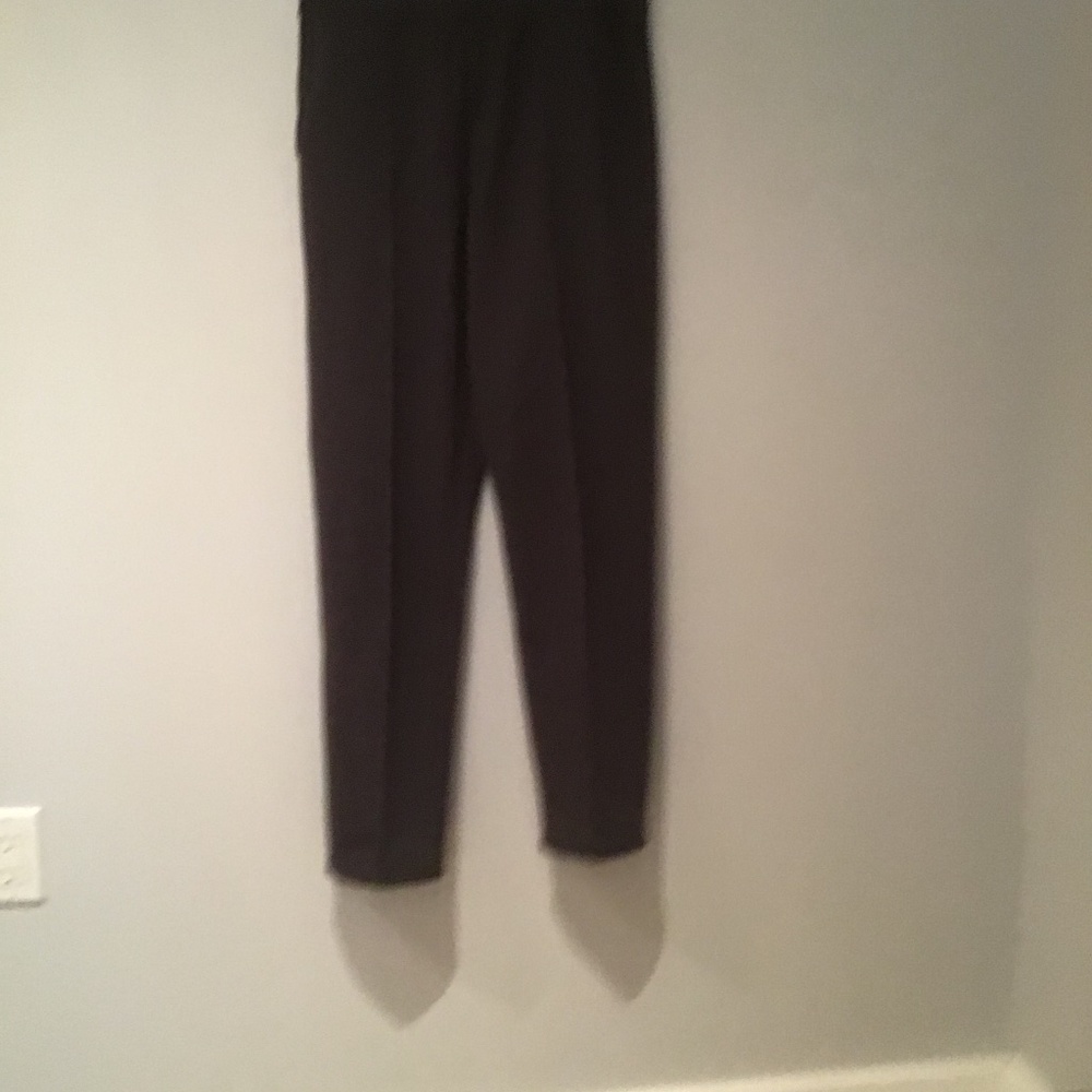 Dark purple slightly tapered pants.